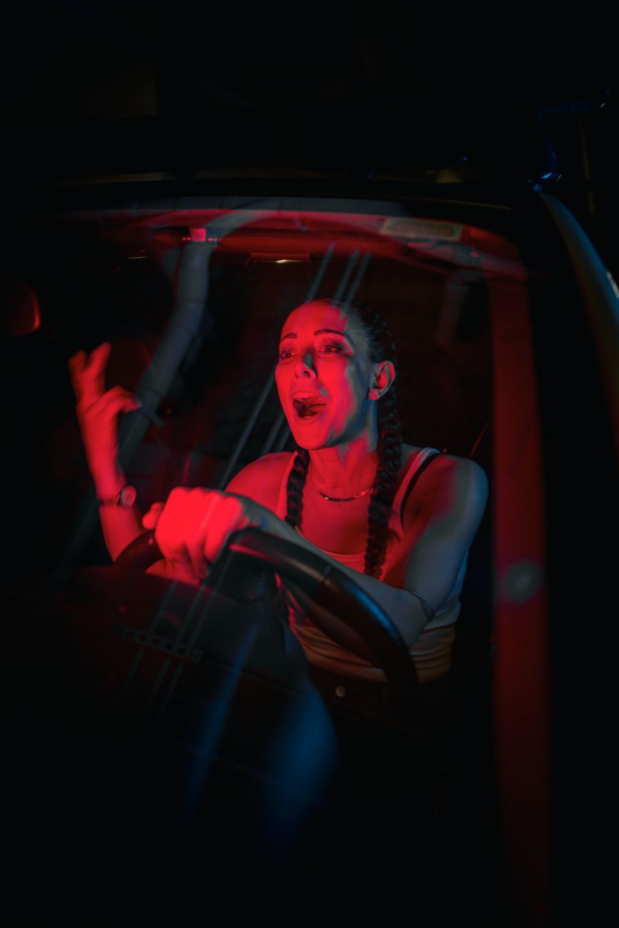 woman driver yelling in the car