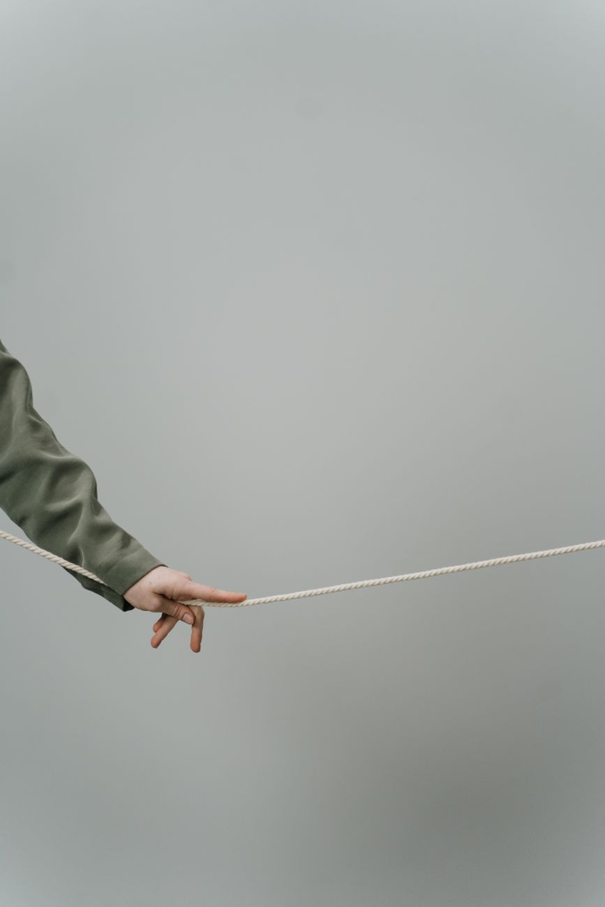 a person holding a rope